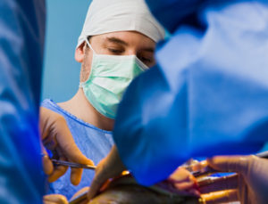51679990 - surgeons working in the emergency room in team.